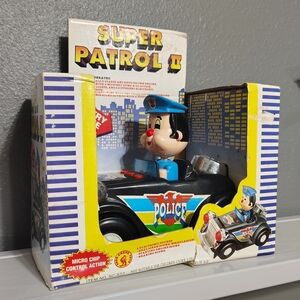 Rare Vintage Super Patrol II Police Car Toy with Blue and Black Design